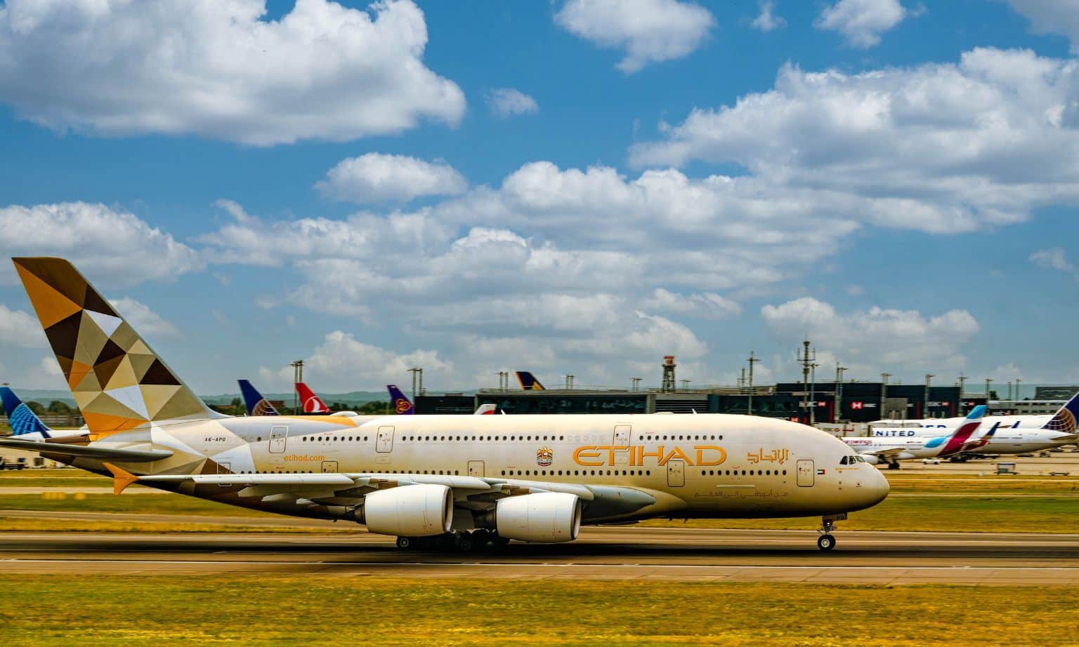 A Middle East airline Etihad plane sits on the tarmac