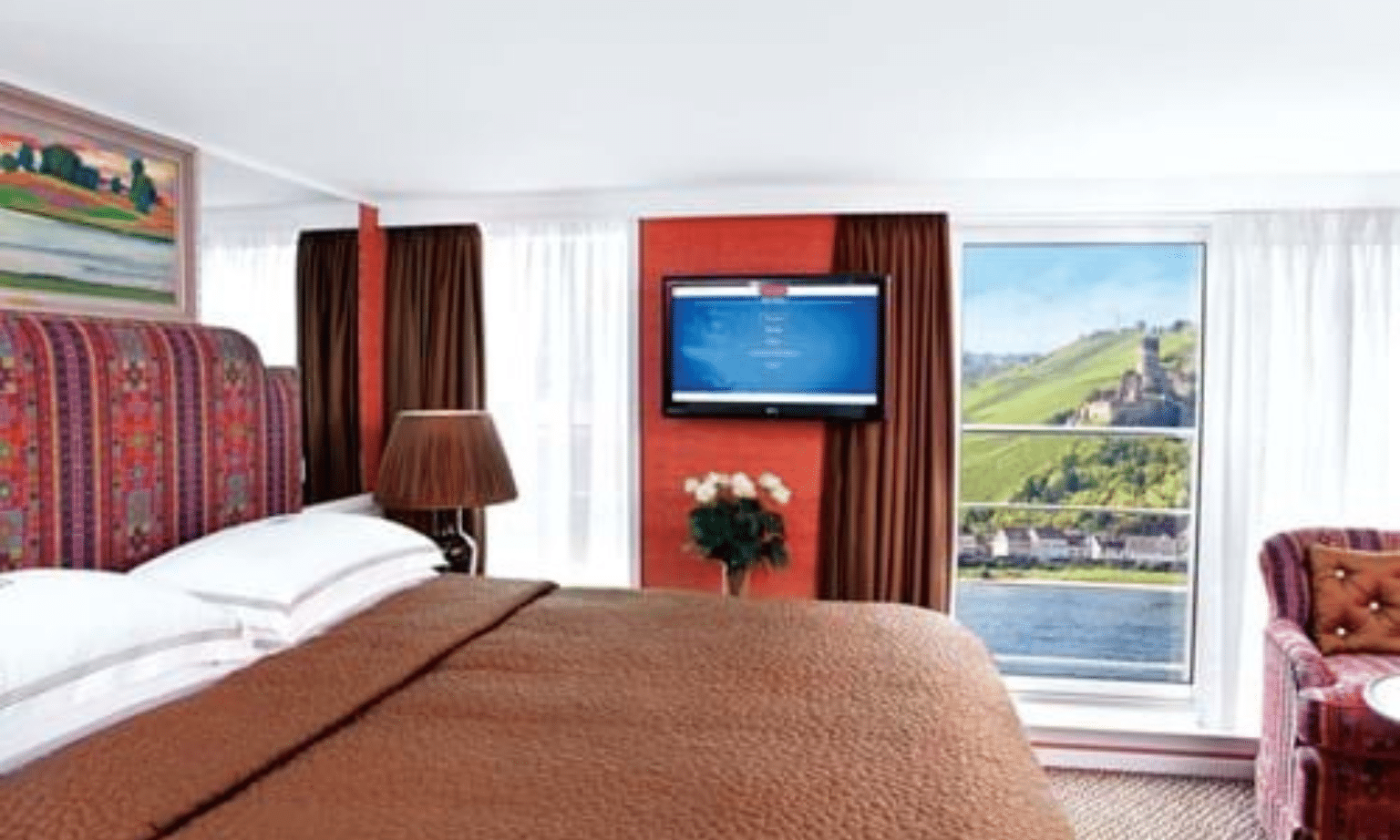 a bedroom on the trafalgar river cruise ship reverie