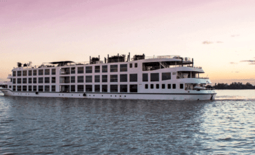 The Scenic Spirit glides along the Mekong river